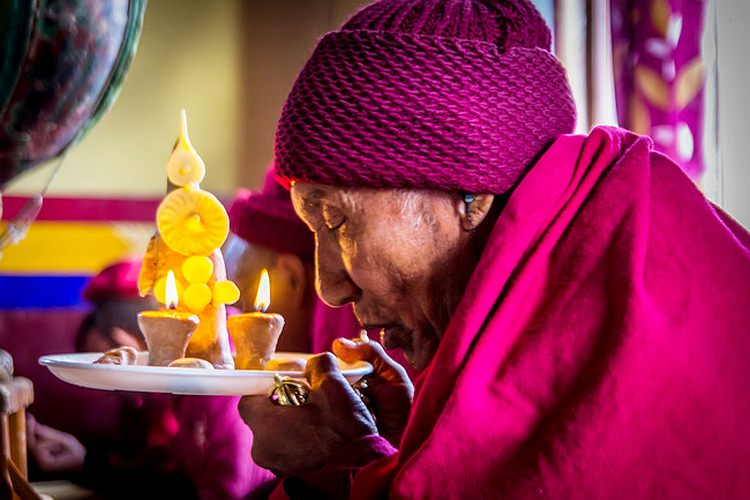A monk, praying during a prayer session